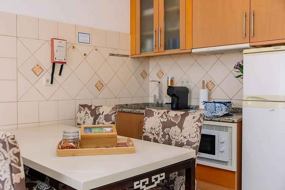 Prepare quick meals easily with generous counter space and appliances.