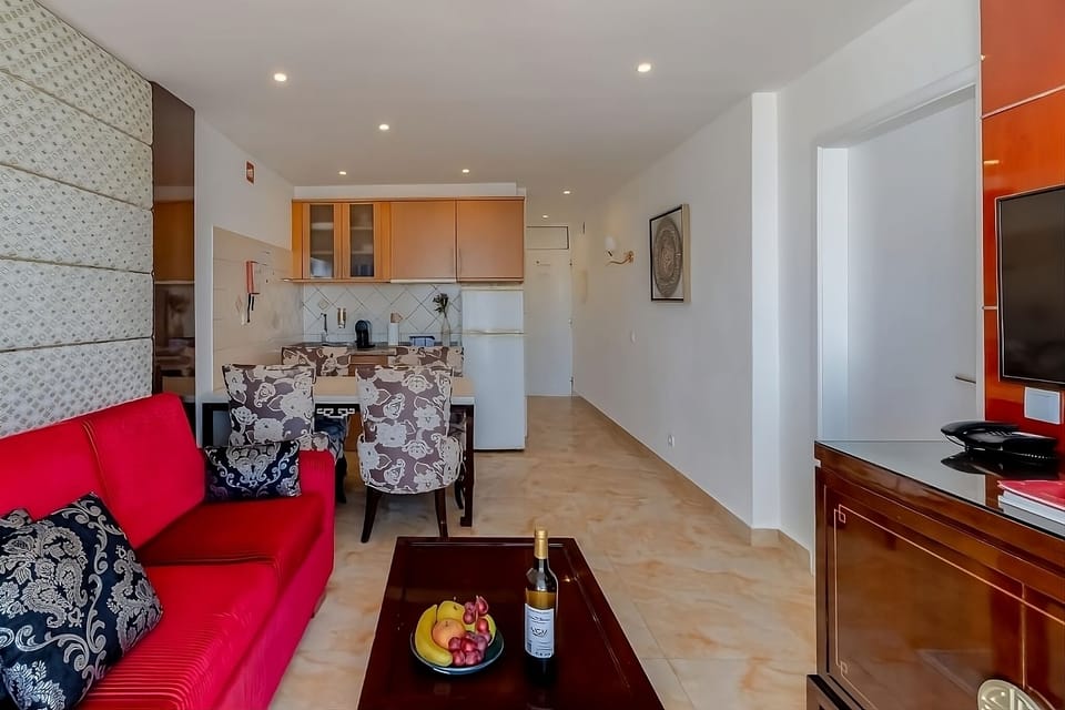 Gather for easy meals in this airy open-plan space.