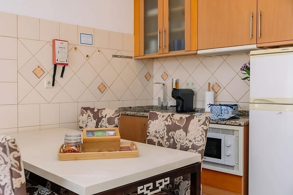 Prepare quick meals easily with generous counter space and appliances.