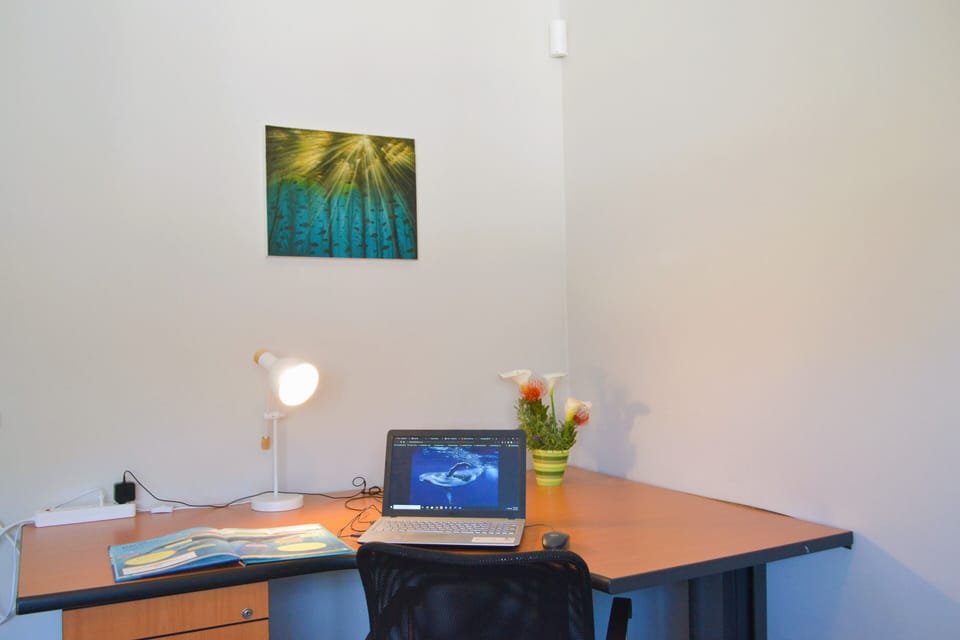 Remote working is a breeze at the large desk, with free WiFi access.
