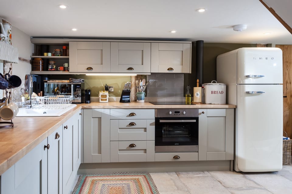 Bright and airy well-equipped kitchen