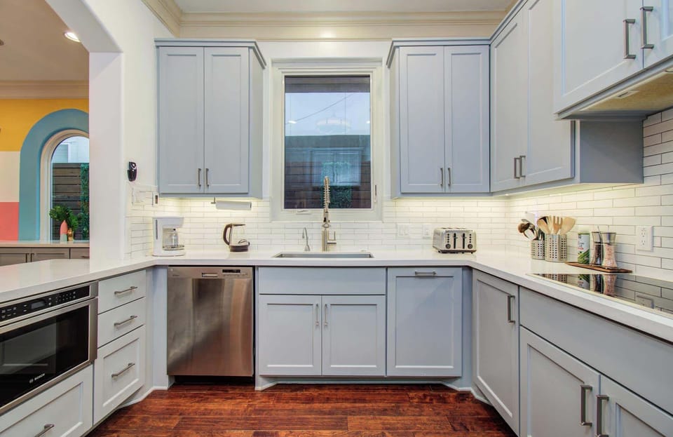 Bright, charming, and functional, this kitchen looks like it waltzed off of Joanna Gaines’ Magnolia Network!