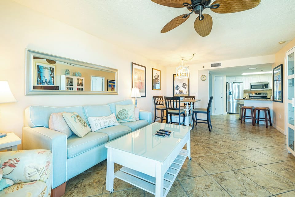 Gather around the elegant dining table with loved ones, enjoying laughter and stories amid vibrant decor