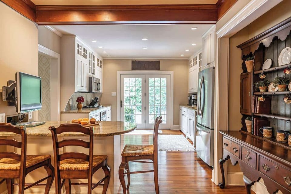 Kitchen that leads to our private backyard pool