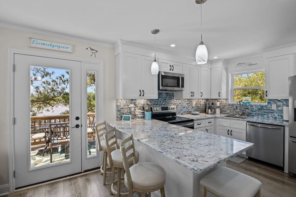 Discover convenience and style: Kitchen with seating bar.