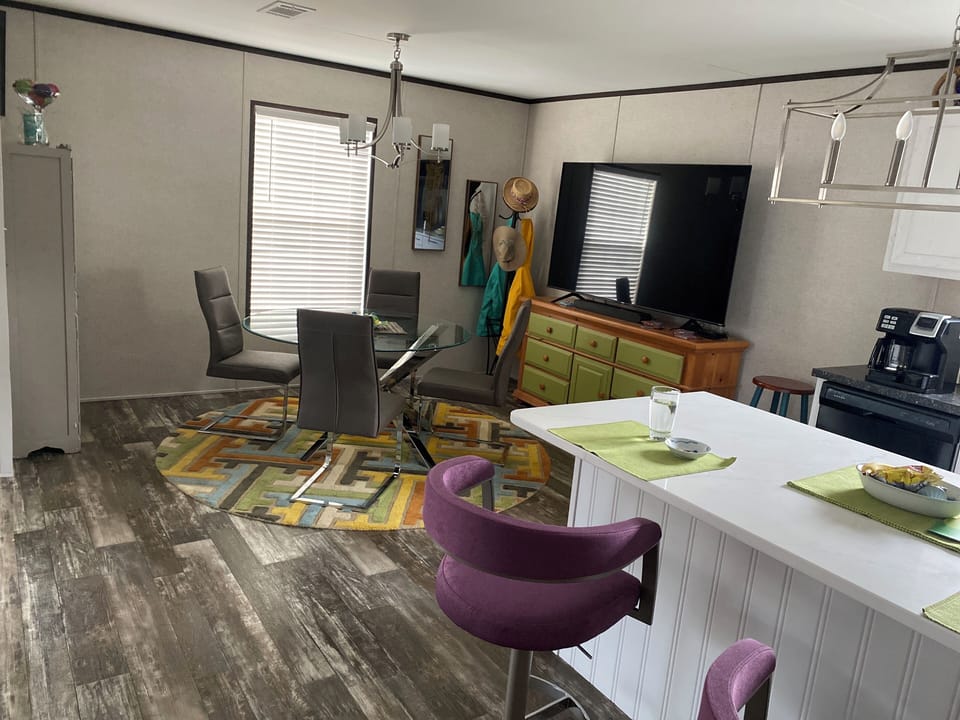 Separate dining area and 75 in TV