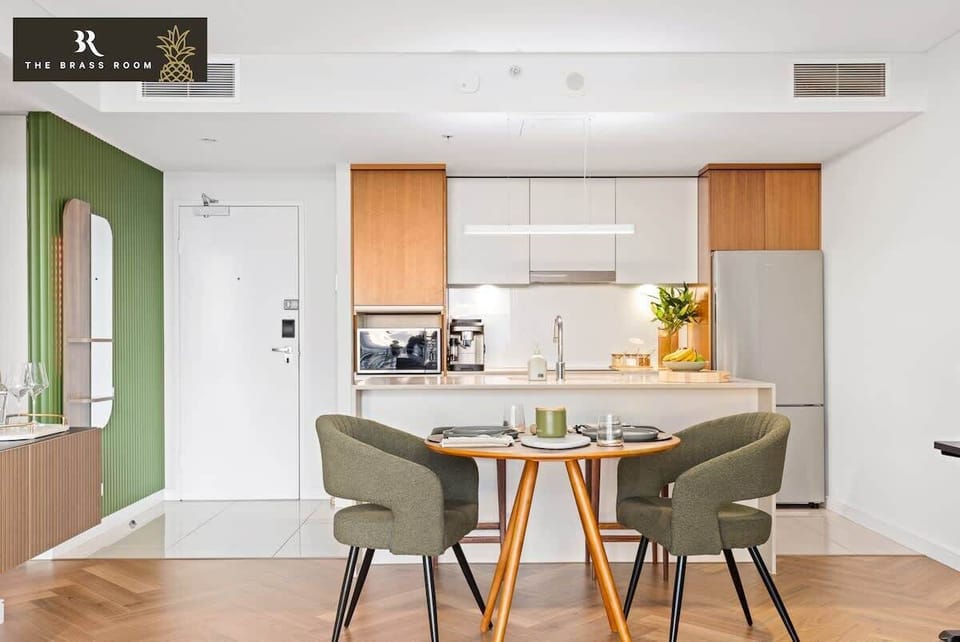 The kitchen and dining area offers two bar stools for the kitchen island, perfect for breakfast or a drink. The dining area also has seats for two.