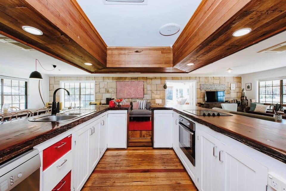 The country-style kitchen is fully equipped with everything you need to cook meals at home, plus a dishwasher for easy clean-up. 
