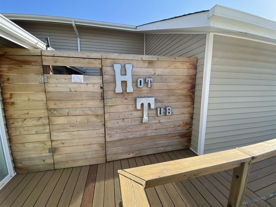 The hot tub is shared with all 4 cottages. Your privacy time is posted