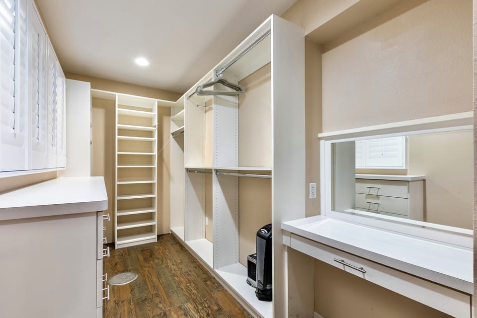 Huge walk in closet in bedroom 2. Also has seating area that can be used as desk