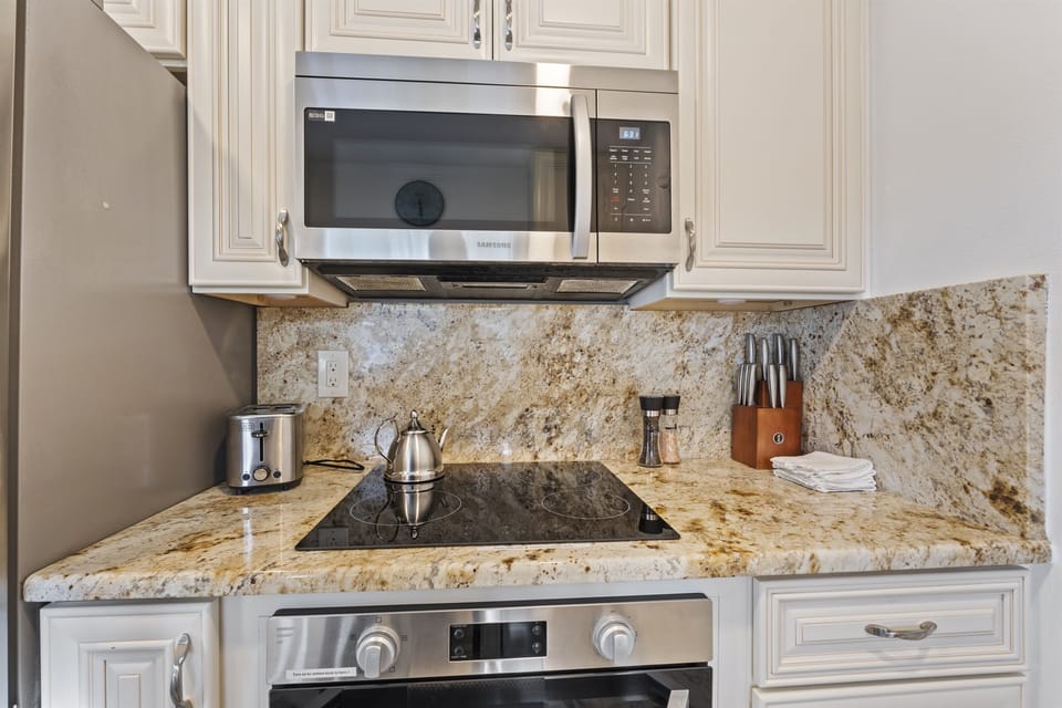 Stainless steal microwave. Glass top stove.