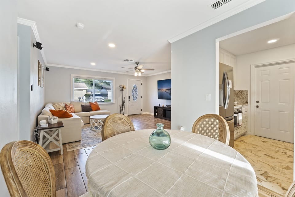Dining space for 4 leads to the kitchen.