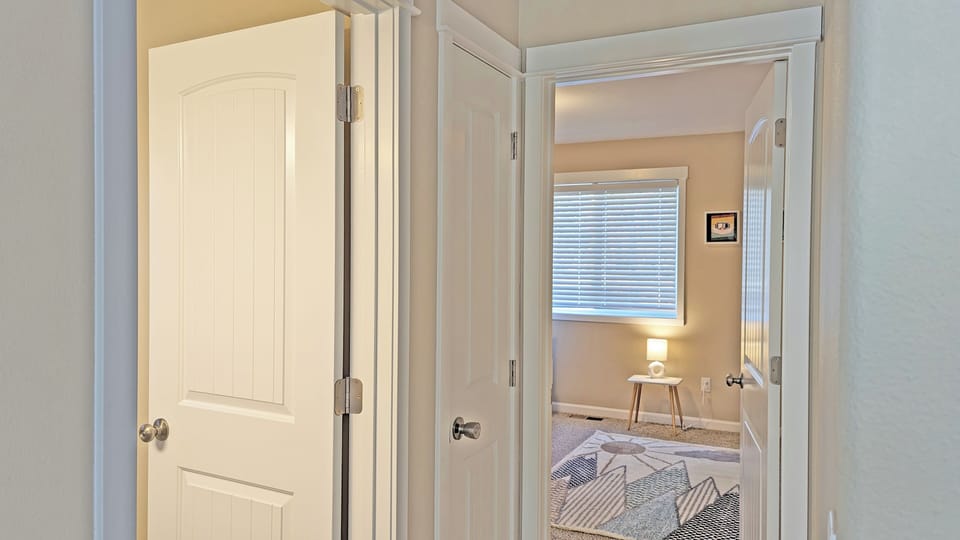 Left- Hall Bath Ahead - Third Bedroom