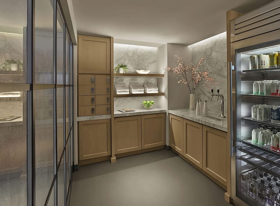 Refresh anytime with chilled drinks and a sleek snack nook.