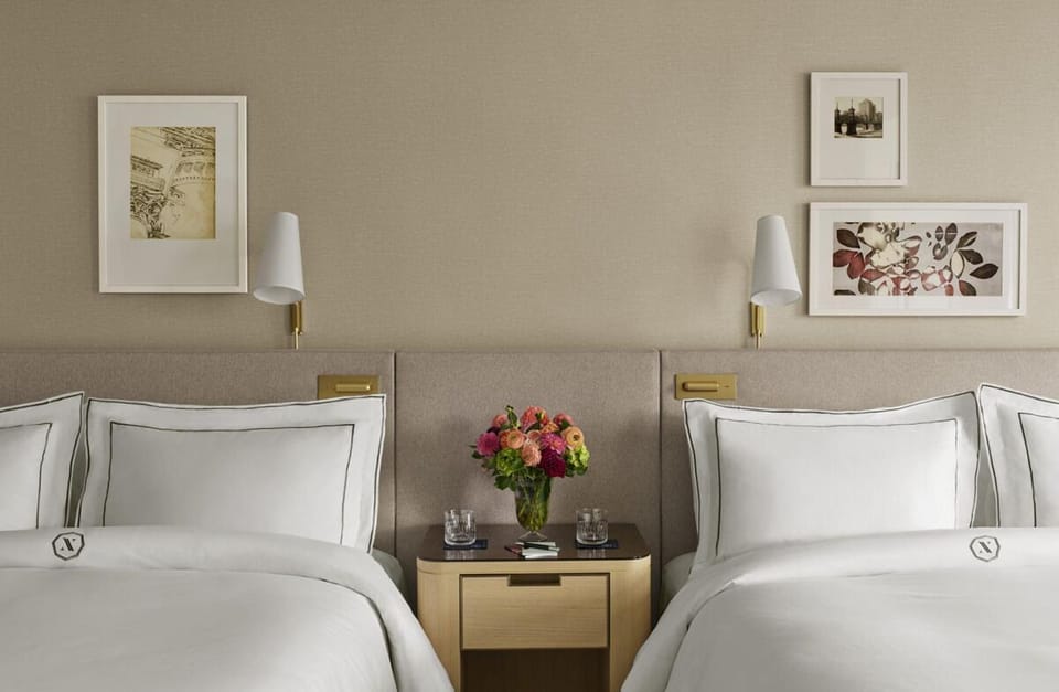 Share restful nights with crisp linens and thoughtful bedside lighting.