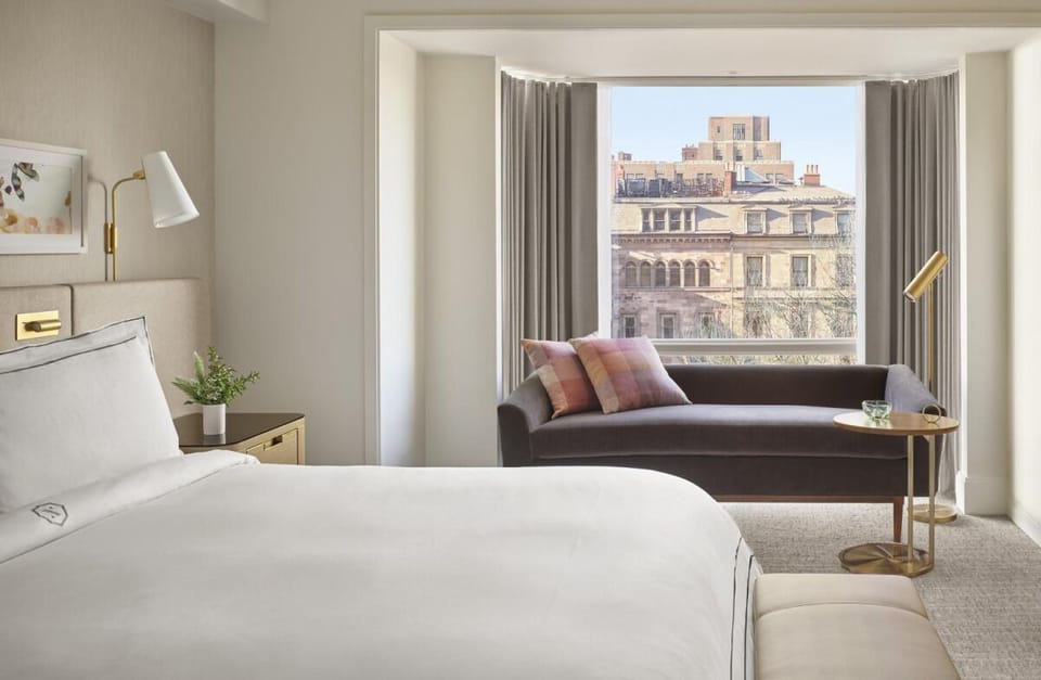 Wake up to skyline light from your cozy window sofa.