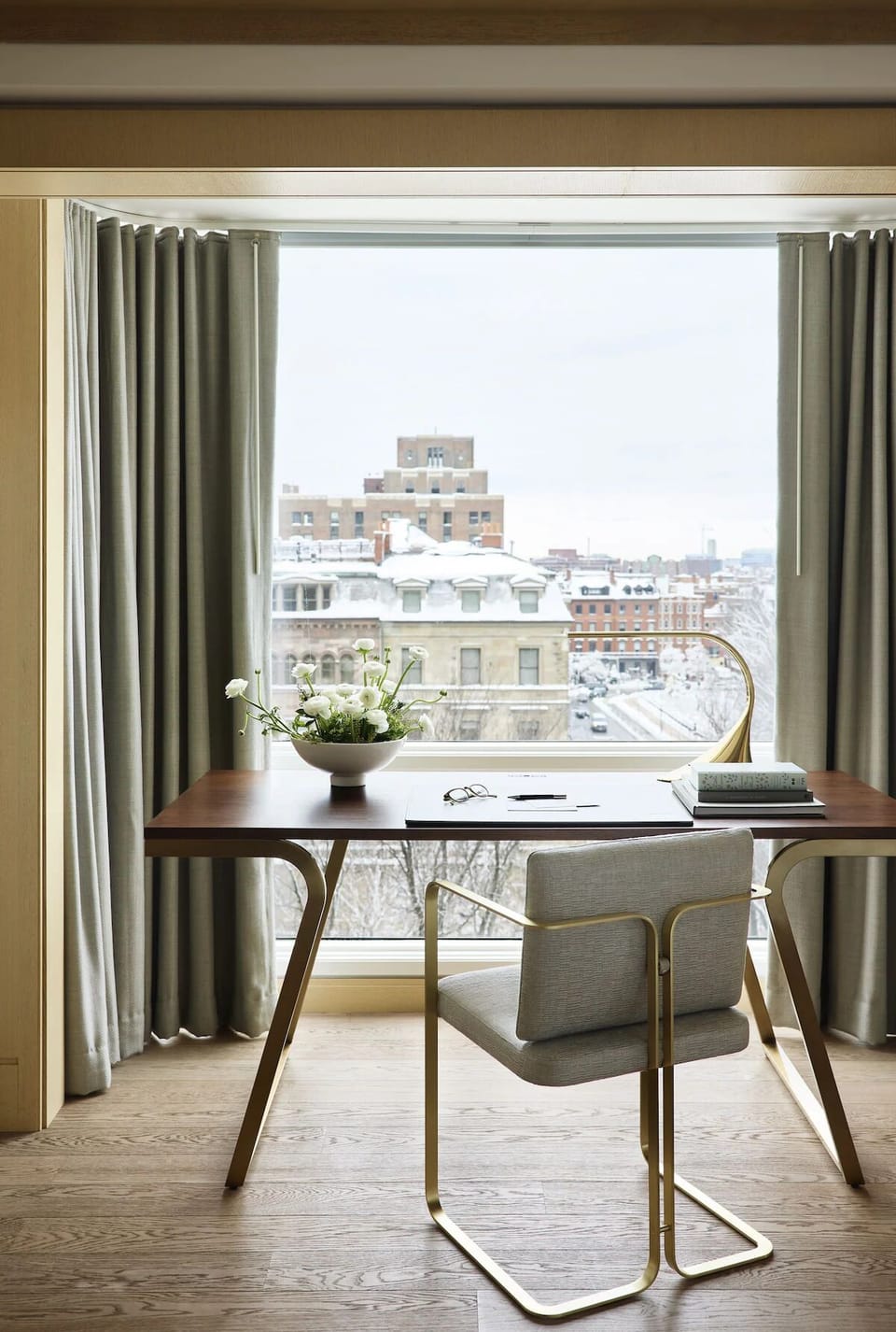 Work peacefully at a designer desk overlooking the city.