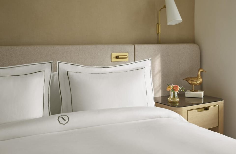 Settle in with soft bedside lighting and luxe nightly touches.