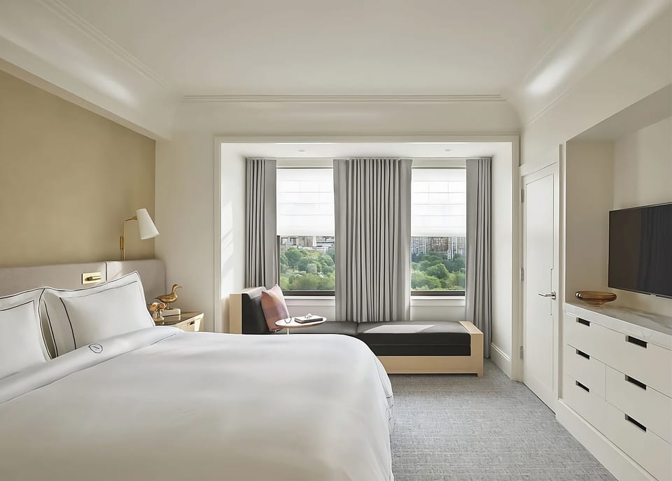 Arrive and relax in a bright retreat with calming park views.