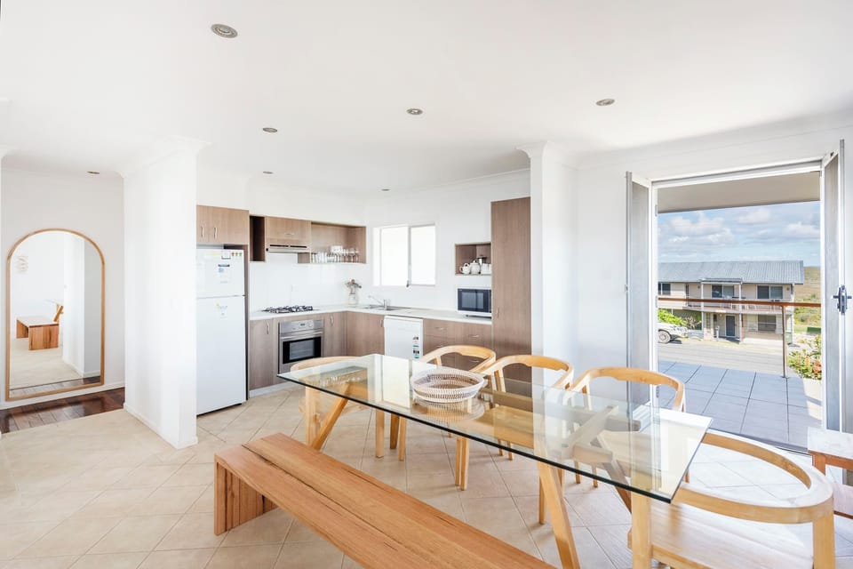 Beachies - Angourie accommodation with ocean views - Open plan kitchen, living & dining with ocean views