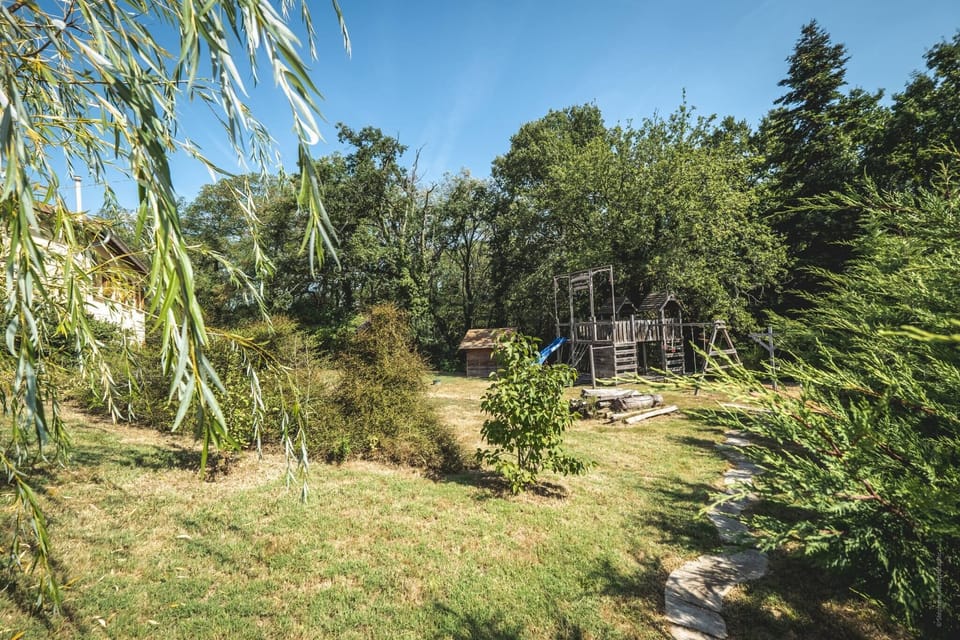 Outside: Large terraces - Tables - Charcoal BBQ - Above-ground swimming pool - Trampoline + Wooden play area for children.
