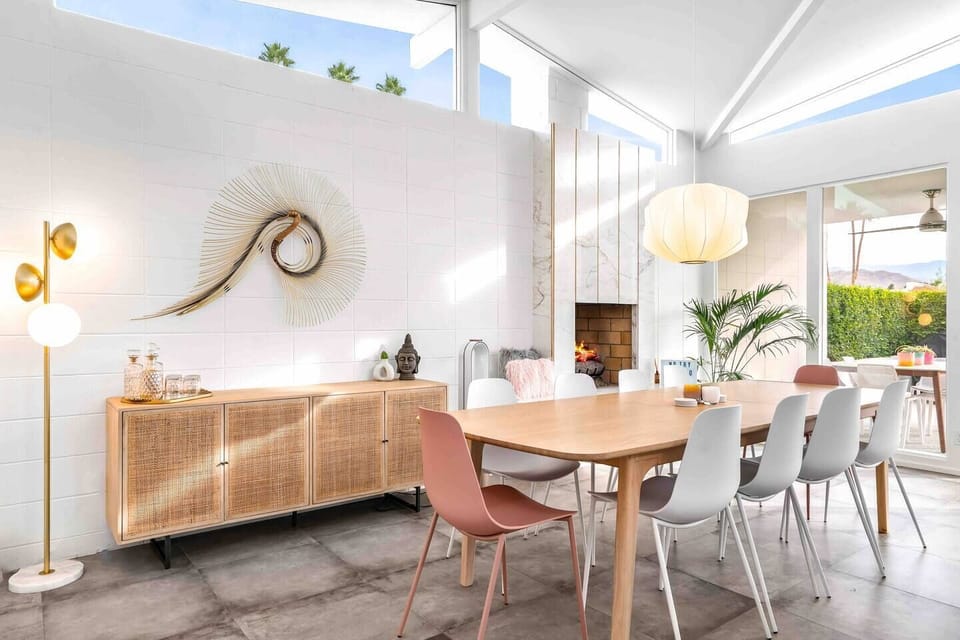 Beautiful decanters, artwork, lighting and furniture with table seating for 8! 