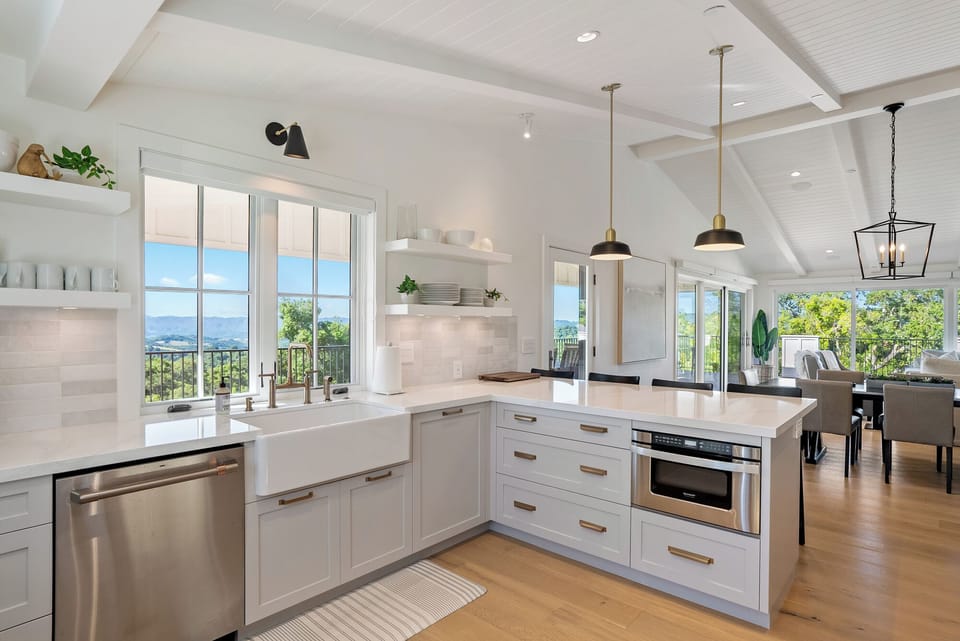 Kitchen - In the Main House, the kitchen features a double wide sink, convection oven and views that go on forever!