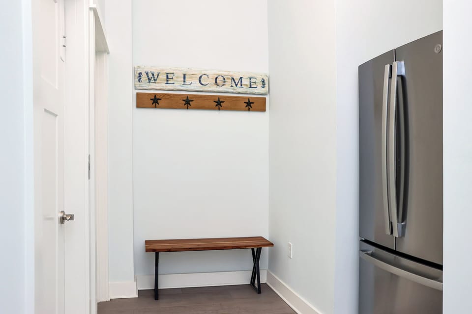 Ground Floor Entrance with Elevator and Refrigerator