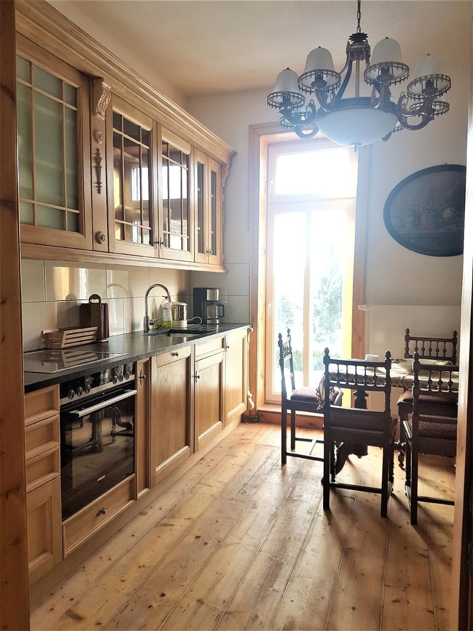 Oak Kitchen with entrance to Balkony