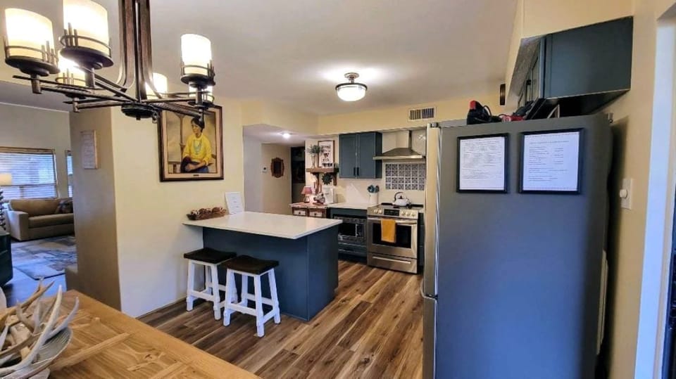 Our custom turquoise cabinets with solid surface counter tops.