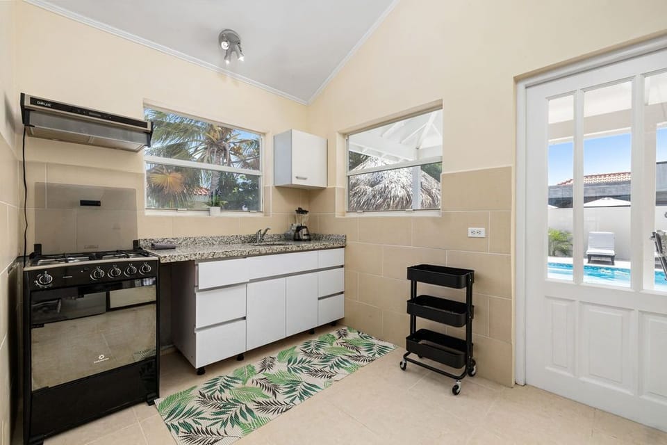 Prepare delectable meals for your family and friends. There is a free-standing stove and a coffee maker in the kitchen.