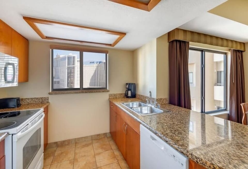 Cook easy meals in the bright kitchen with granite counters.