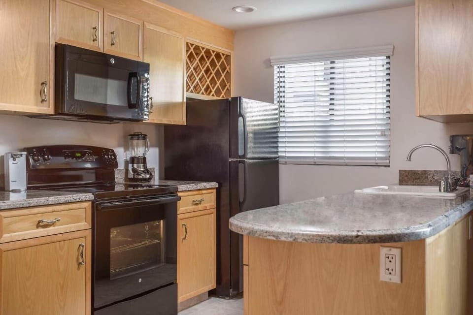 Prep home-style meals with full appliances and generous counter space.