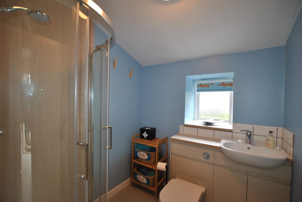 Enjoy the fresh and bright shower room