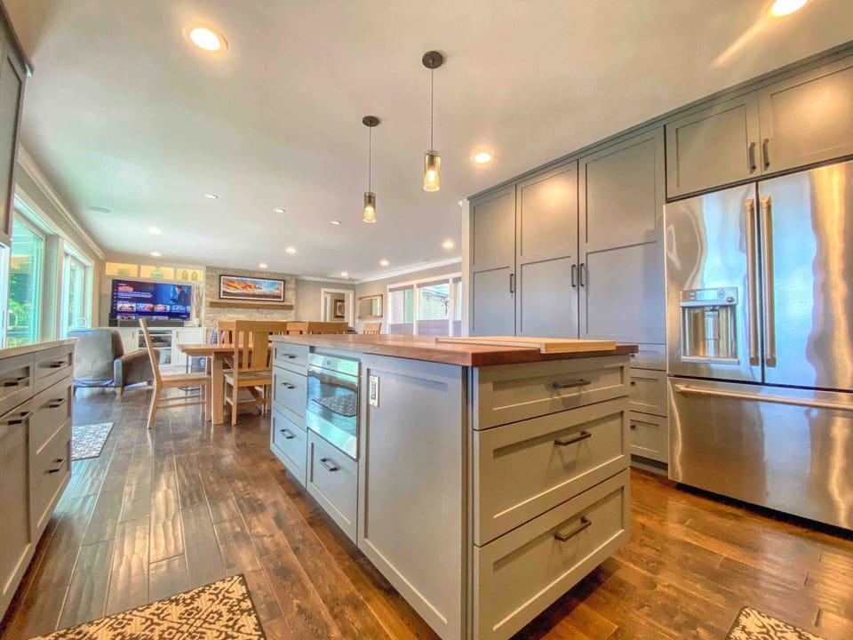 A large island houses the pots, pans and a built-in Wolf Microwave