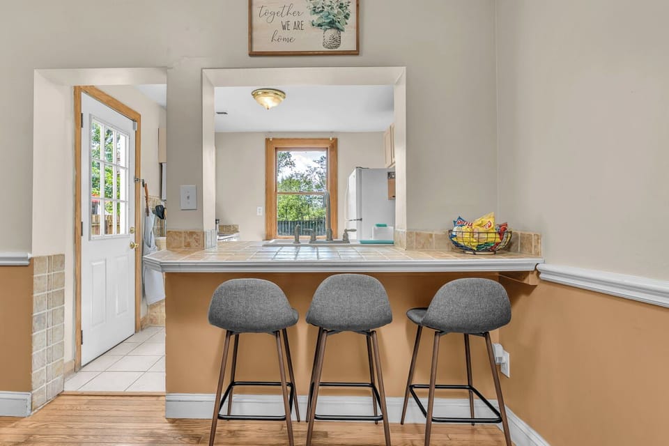 Sit at the counter, enjoying some snacks or having conversation while cooking