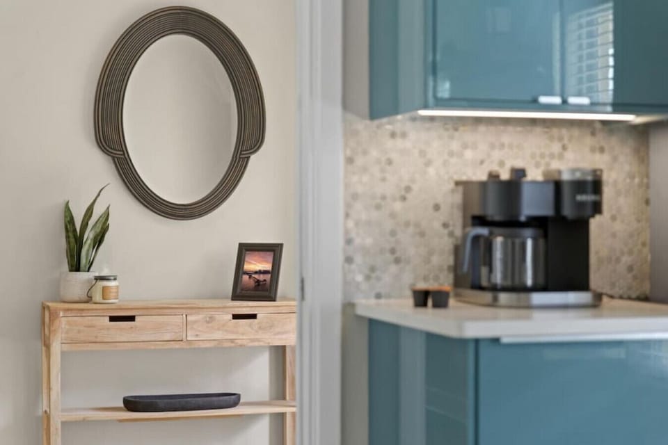 Around the corner from the foyer you will find the modern Kitchen