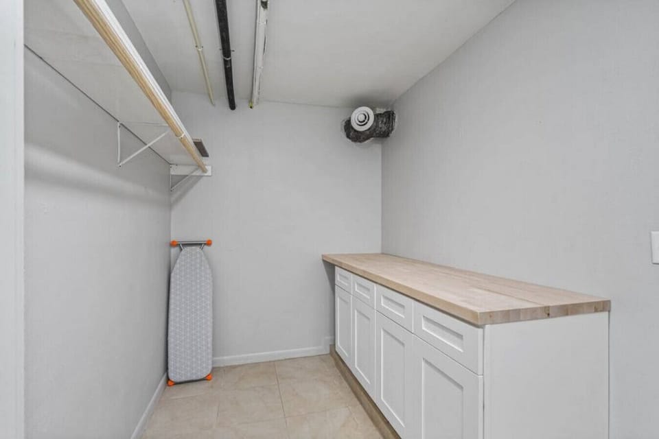 Spacious set-up to help keep your guests organized and laundered!