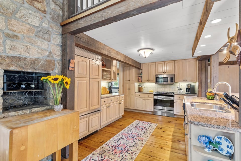 Open kitchen concept with microwave and gas stove