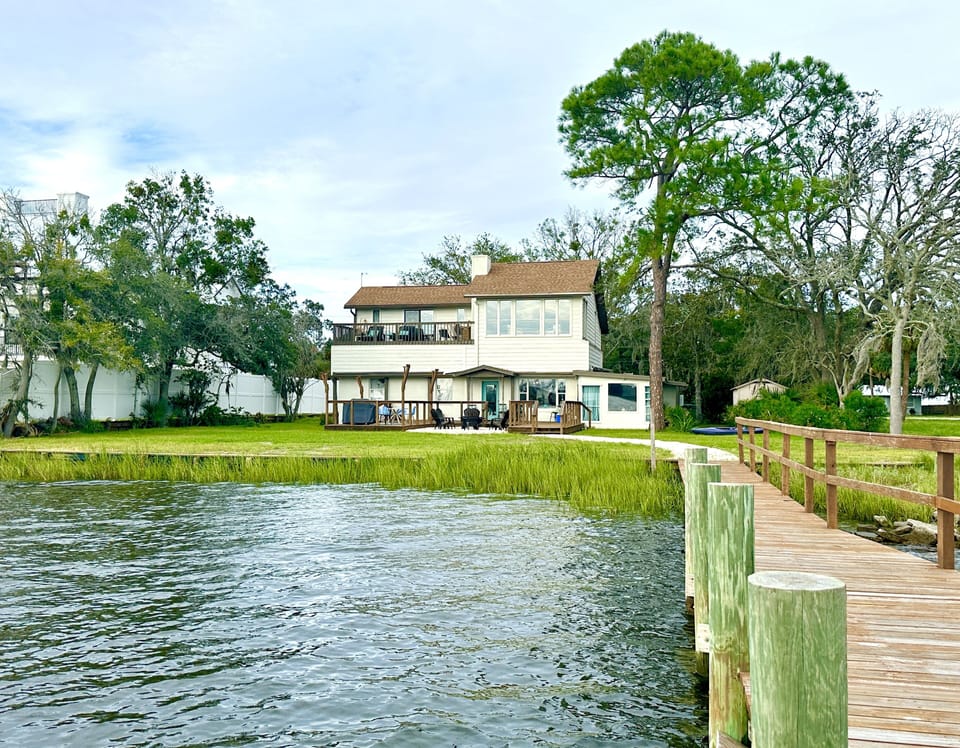 Fabulous short dock leads to sizable backyard fun for games, grill, hammocks etc