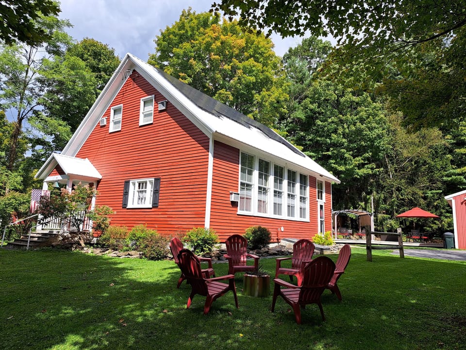 Firepit and Adirondack seating available seasonally