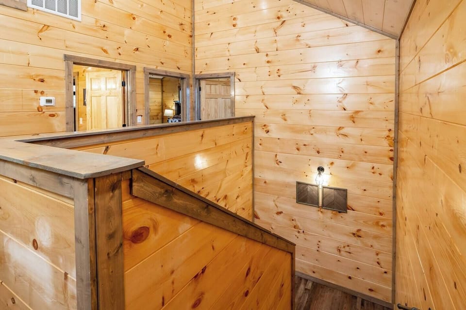 Upstairs, you will find the remaining four bedrooms and two bathrooms.