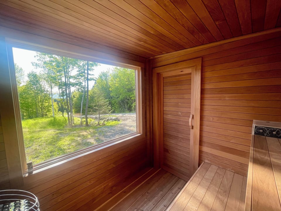 Relaxing forest views from the custom cedar sauna