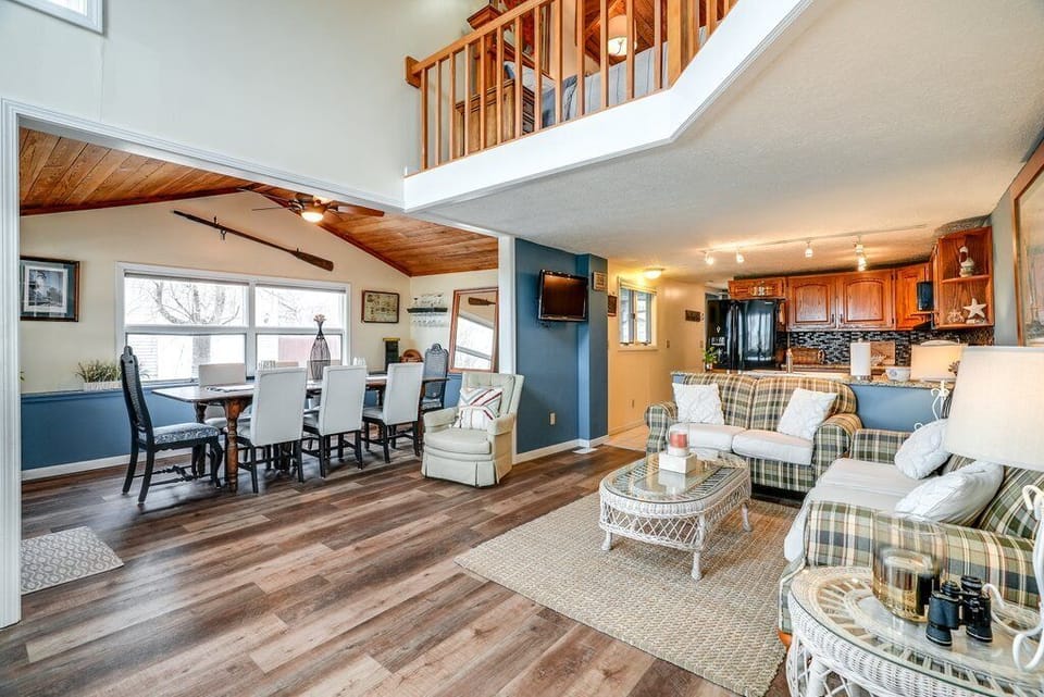 Open floor plan with living room, dining room & kitchen.