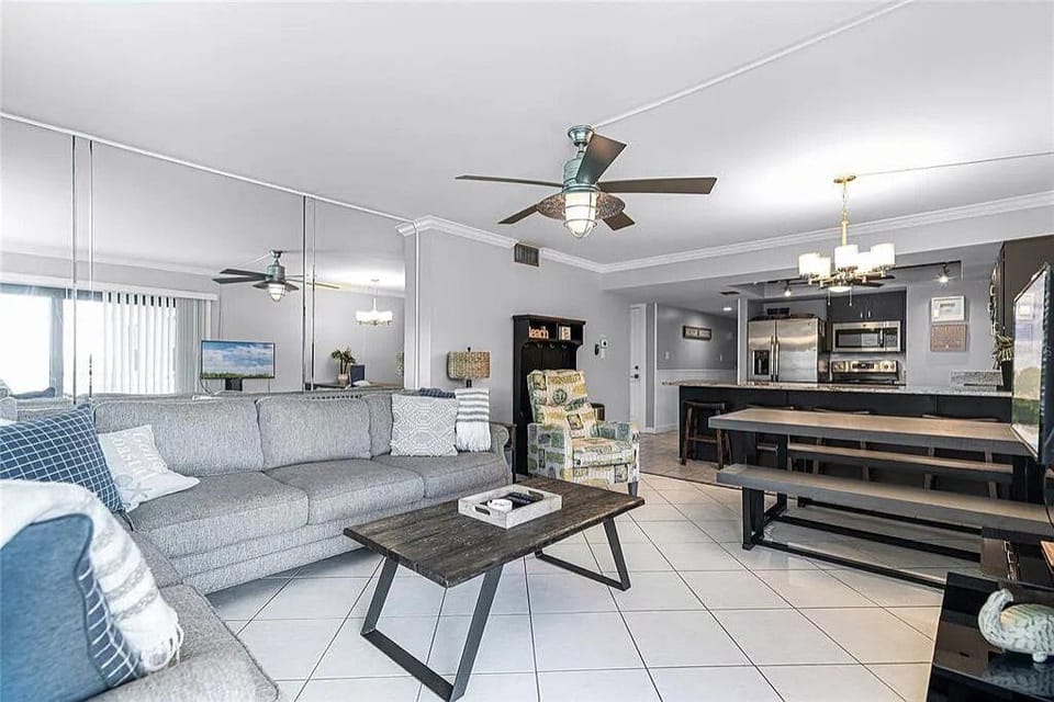 Lounge in our spacious, open-concept living room, direct with balcony access.