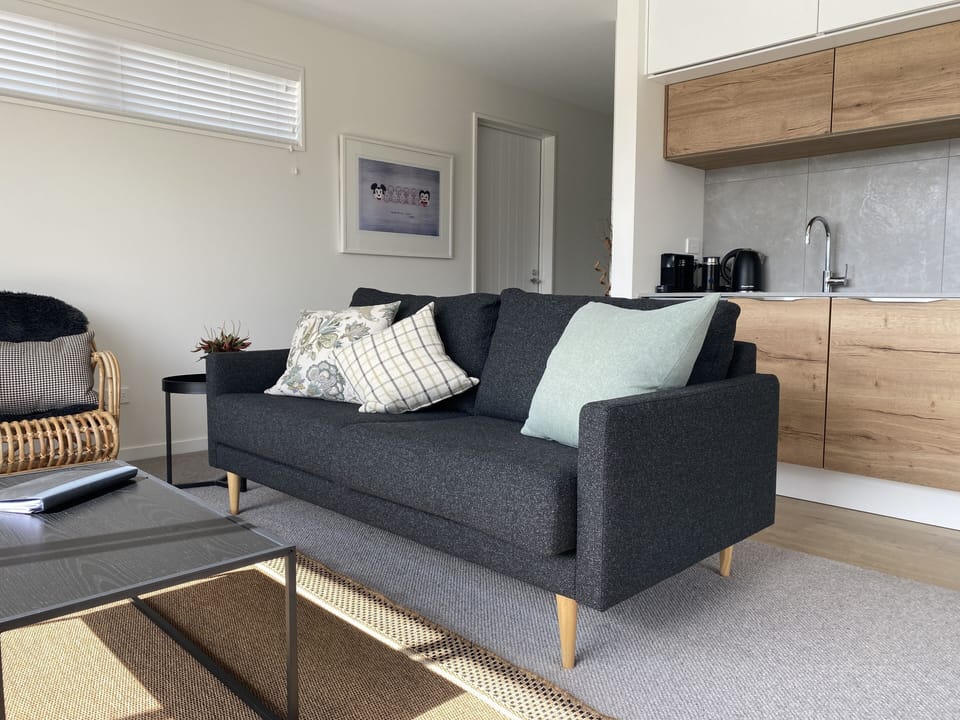 Sun soaked open plan lounge, kitchen and dining space, great views of the lake.