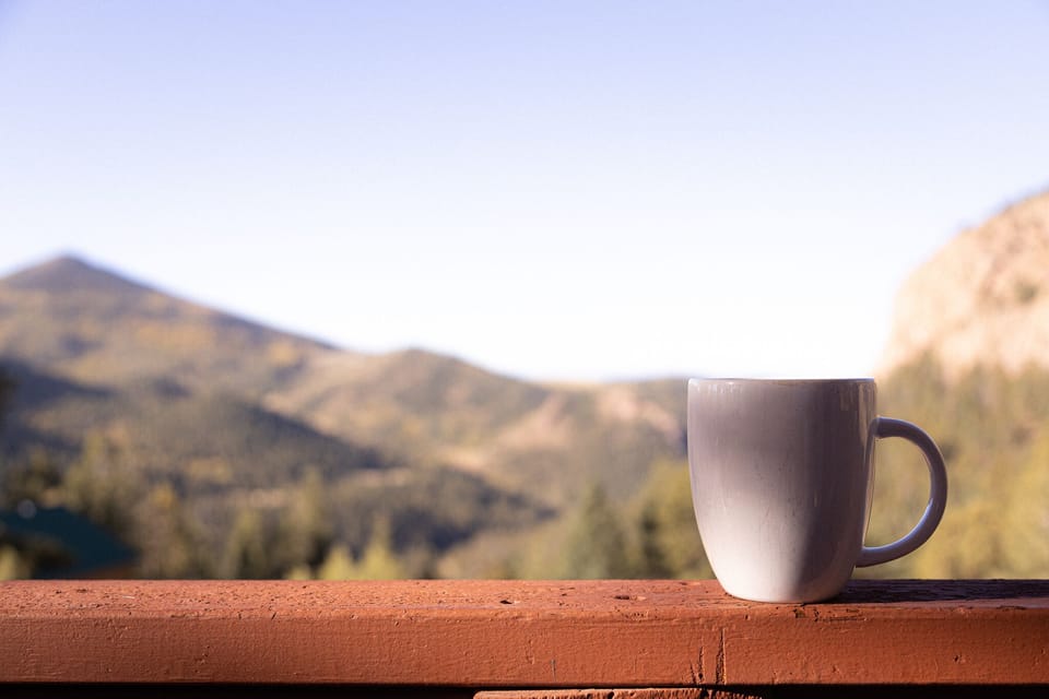 Sip in the Splendor: Enjoy a Cup of Serenity on Our Balcony with Stunning Views 🌅☕🍃