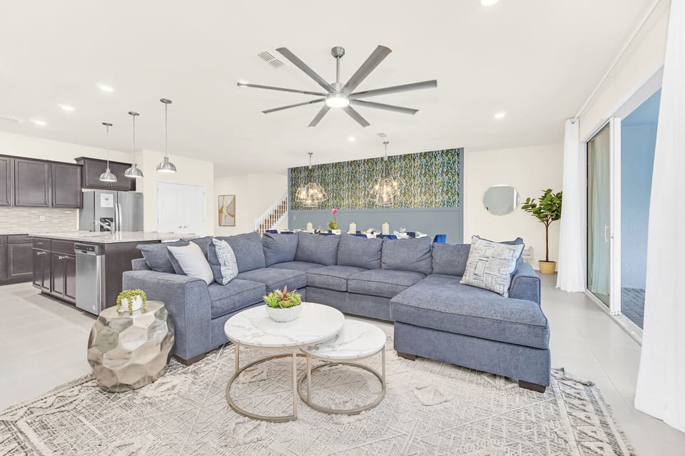 Comfy sectional seating area downstairs with flat screen TV