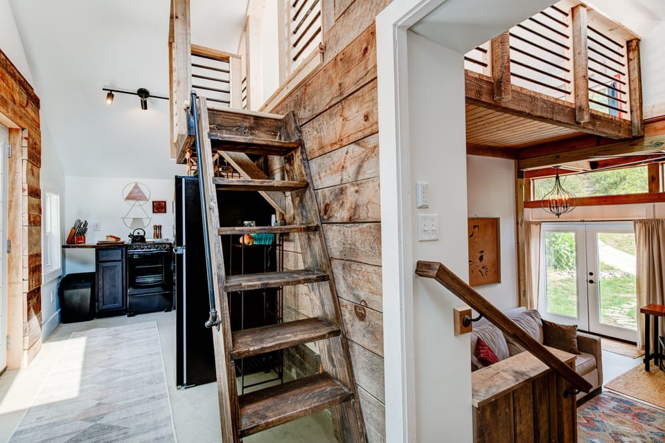  The space is open with very high ceilings.