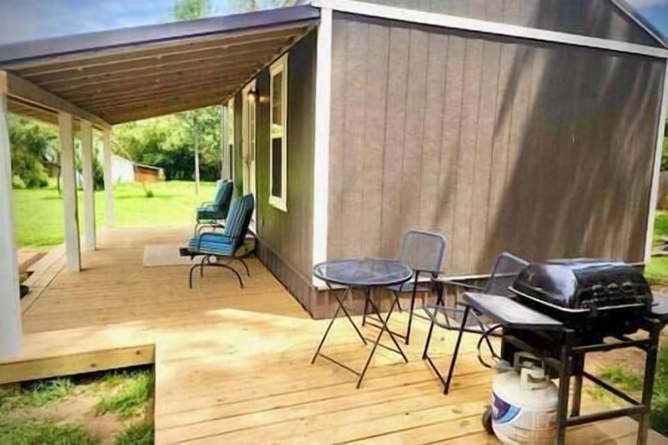 Sun or shade areas to relax. Gas grill.